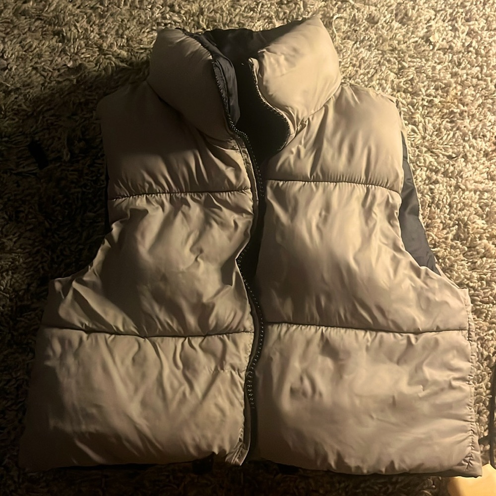 Dark coffee color vest , xtra small